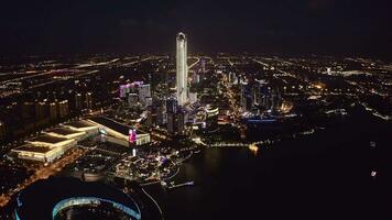 CBD buildings by Jinji Lake at night in Suzhou, China. video