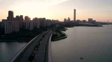 Sunrise with CBD buildings. Aerial in Suzhou, China. video