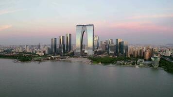 CBD buildings by the lake. Aerial in Suzhou, China. video