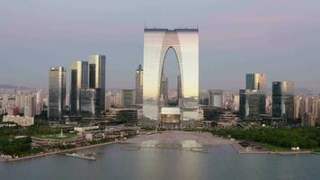 CBD buildings by the lake. Aerial in Suzhou, China. video