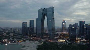 Aerial of CBD buildings by Jinji Lake in Suzhou, China. video