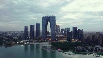 Aerial of CBD buildings by Jinji Lake in Suzhou, China. video