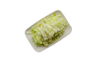 Cut fresh cabbage on dish. on transparent background png
