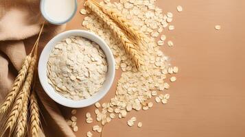 Oat milk in a glass and mug on a background. Flakes and ears for oatmeal and granola on a wooden plate. AI Generated photo