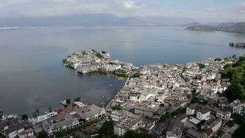 Village and lake in Shuanglang, Yunnan, China. video