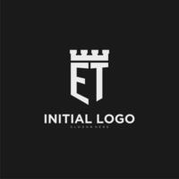 Initials ET logo monogram with shield and fortress design vector