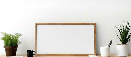 White table with computer coffee cup and picture frame in a stylish workspace photo