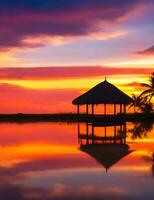 A tranquil bungalow illuminated by a vibrant Caribbean sunset, its silhouette creating a mesmerizing reflection. Generative AI photo