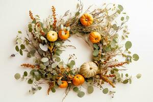 Seasonal Foliage and Pumpkin Wreath on White Background - Generative AI photo