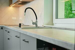 Modern kitchen interior with cabinets and empty countertop photo