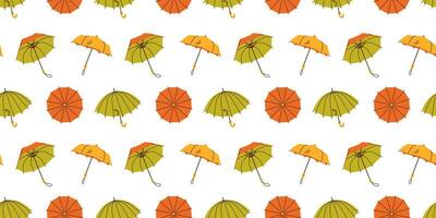 Seamless pattern with hand drawn red yellow green opened umbrellas on white background in flat cartoon style. For background, packaging, textile vector