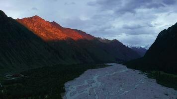 River and mountains at sunset. video