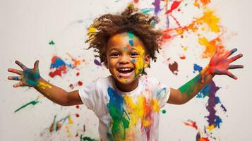 Cute little boy laughing together and having fun with paints. Painted in skin hands. Child portrait. Creative concept. Close up photo