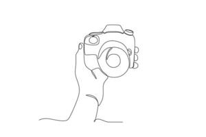 A hand pointed the camera lens forward vector