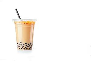 iced milk tea and bubble boba in the plastic glass on the white background with copy space. ai generated photo