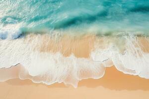 resumen aéreo ver de un arenoso playa con ligero azul olas y Dom Perfecto para verano vacaciones pancartas foto