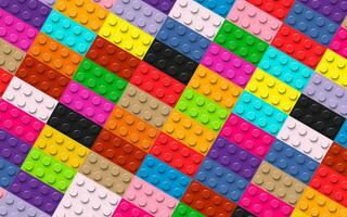 Many toys blocks in different colours. Colorful plastic bricks. Abstract vector pattern background