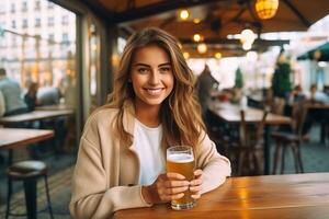 Beautiful girl with beer glass photo