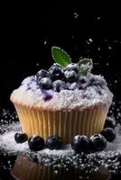 Blueberry cupcake with sugar powder photo