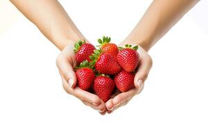 Hand holding fresh strawberries isolated on a white background with copy space. ai generated photo