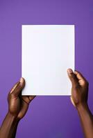 A human hand holding a blank sheet of white paper or card isolated on purple background. ai generated photo