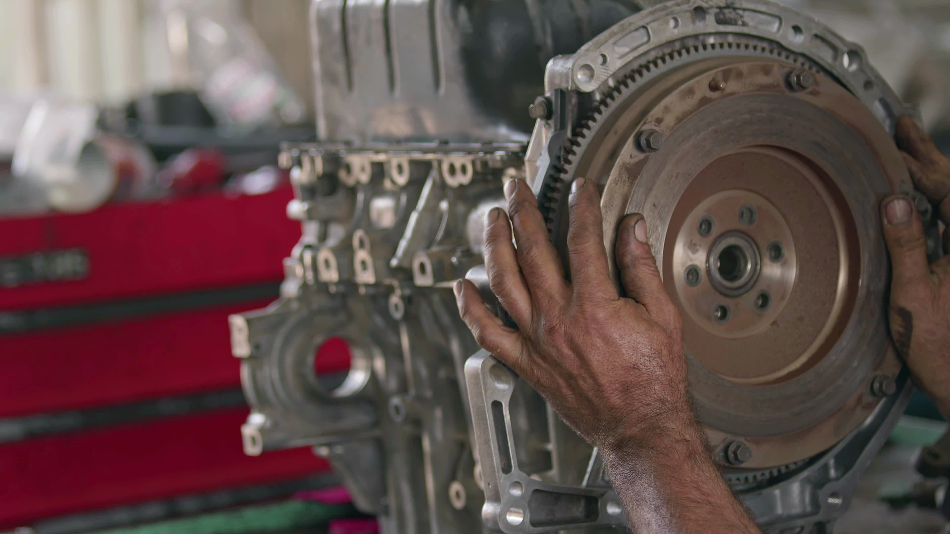 Fitting and Checking the Flywheel Gear of the Car Engine Footage