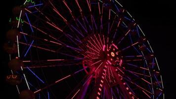 Ferris Wheel Rotating Spinning In The Amusement Park Footage. video