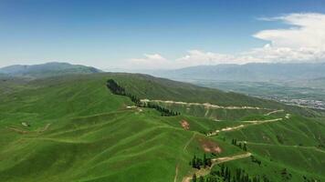 Vast grasslands and mountains in a fine day. video