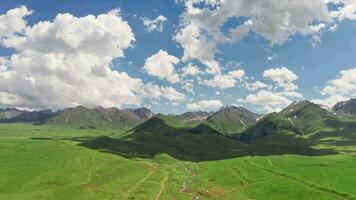 Vast grasslands and mountains in a fine day. video