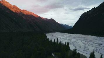 River and mountains at sunset. video