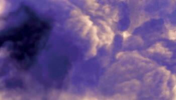 a purple cloud is seen in the sky.  blue sky with clouds. watercolor background vector