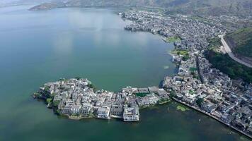 Village and lake in Shuanglang, Yunnan, China. video