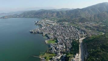 Village and lake in Shuanglang, Yunnan, China. video