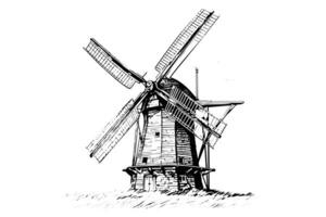 Windmil in the field hand drawn vintage sketch. Engraving style vector illustration. photo
