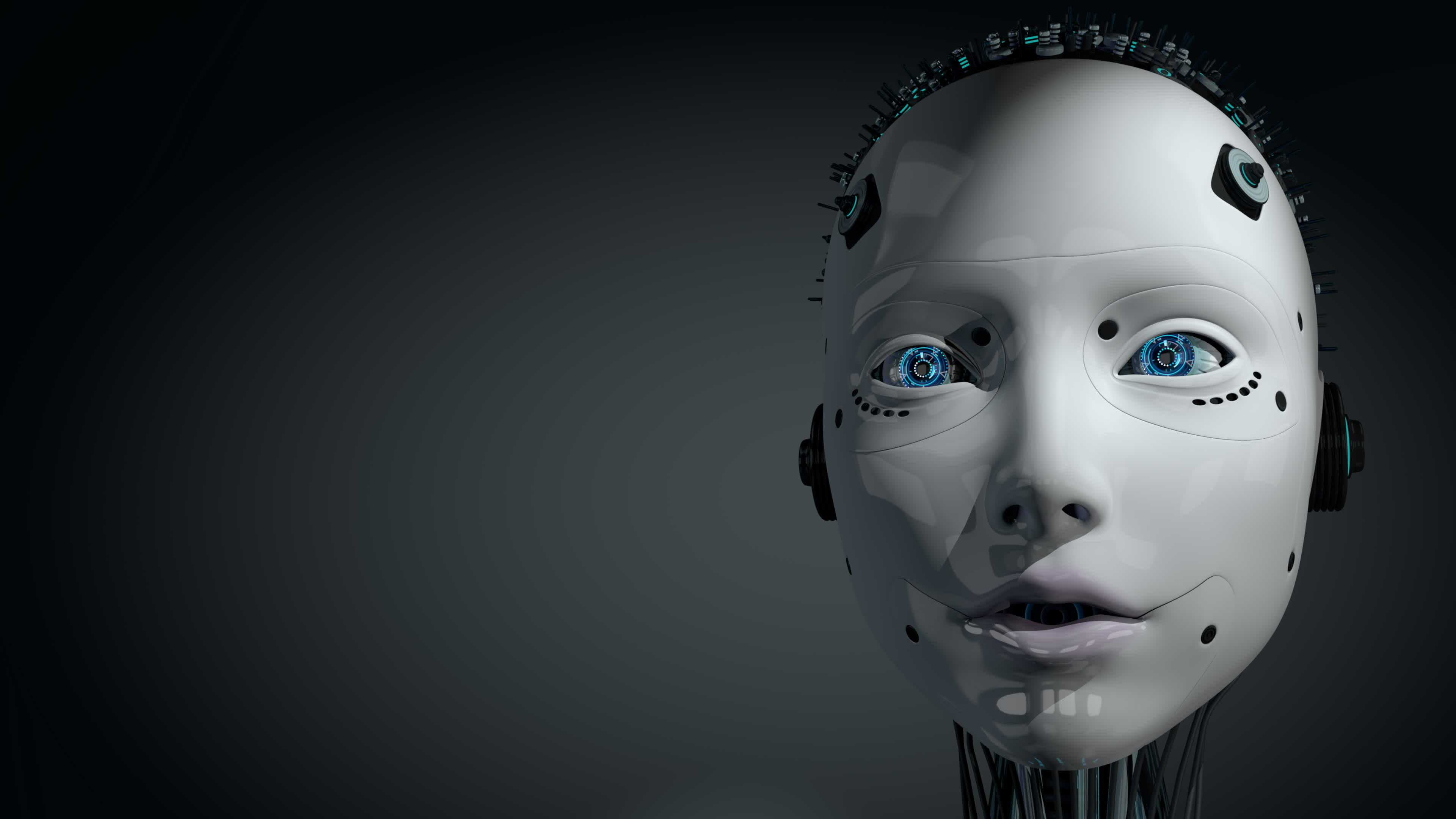 Front view of female humanoid robot head with glowing white skin