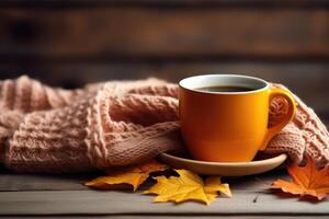 Cup of fresh hot tea with autumn leaves and plaid, top view flat lay, AI Generated photo