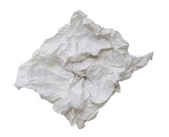 Single screwed or crumpled tissue paper or napkin in strange shape after use in toilet or restroom isolated on white background with clipping path photo