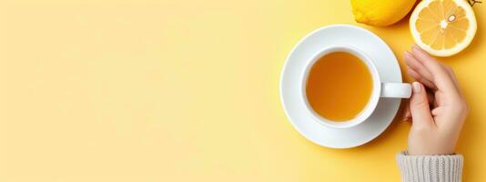 Top view of female hands holding lemon tea, AI Generated photo