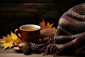 Cup of fresh hot tea with autumn leaves and plaid, top view flat lay, AI Generated photo