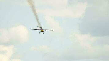 KAZAN, RUSSIAN FEDERATION, JUNE 15, 2019 - Airplane performing stunts at the Red Bull Airshow. Sports light aircraft flies video