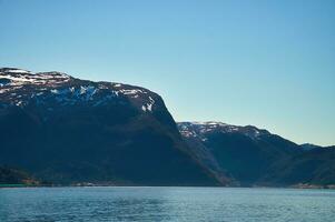 Fjord with view of mountains and fjord landscape in Norway. Landscape shot photo