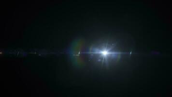 lazo resumen resplandor multicolor estrella óptico lente llamarada ligero video