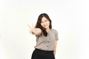 Showing Peace Sign and Smiling Of Beautiful Asian Woman Isolated On White Background photo