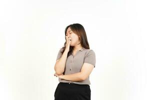 Yawning Gesture Of Beautiful Asian Woman Isolated On White Background photo