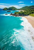 A stunning aerial view of a tropical beach with white sand foamy waves and blue sea photo
