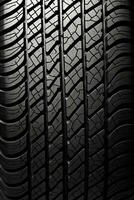 Seamless car tire tracks texture on white background with a seamless design photo