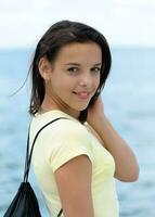 Portrait of a beautiful smiling brunette photo