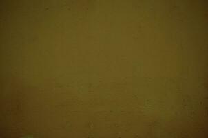 Vintage style old ochre painted grunge wall photo