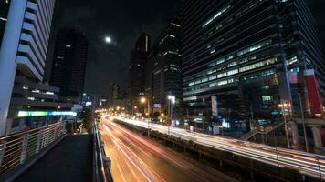 Car traffic in night Bangkok, Thailand photo