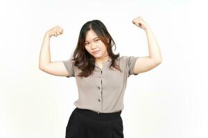 Showing strength arms Of Beautiful Asian Woman Isolated On White Background photo